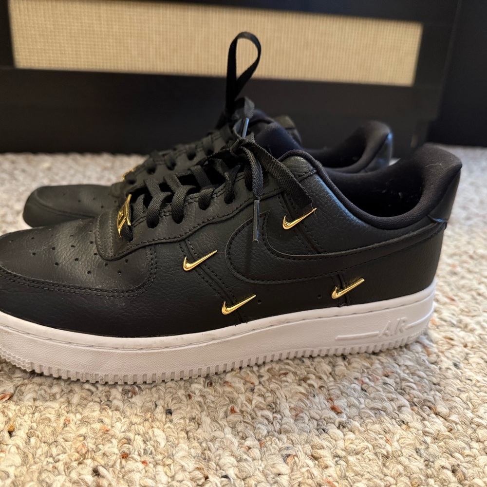 Nike Women’s Black and Gold AF1